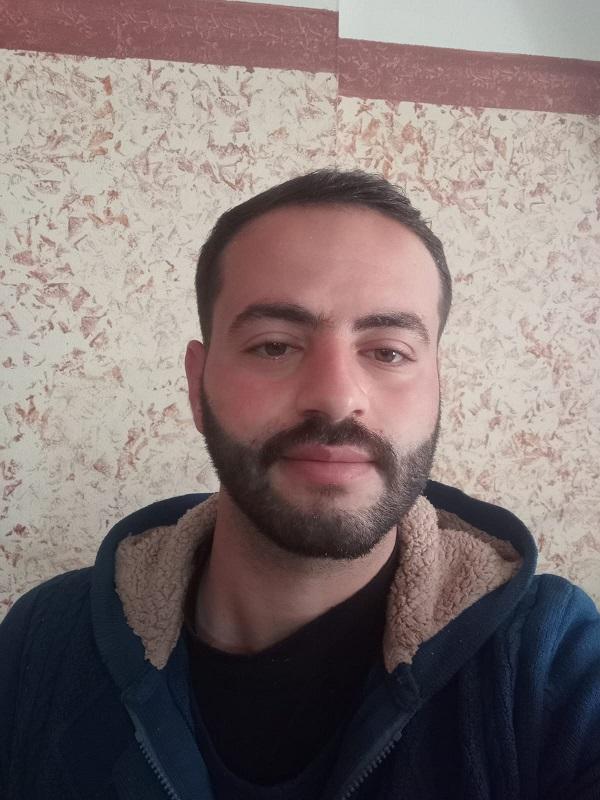 Portrait of Alaa Okal